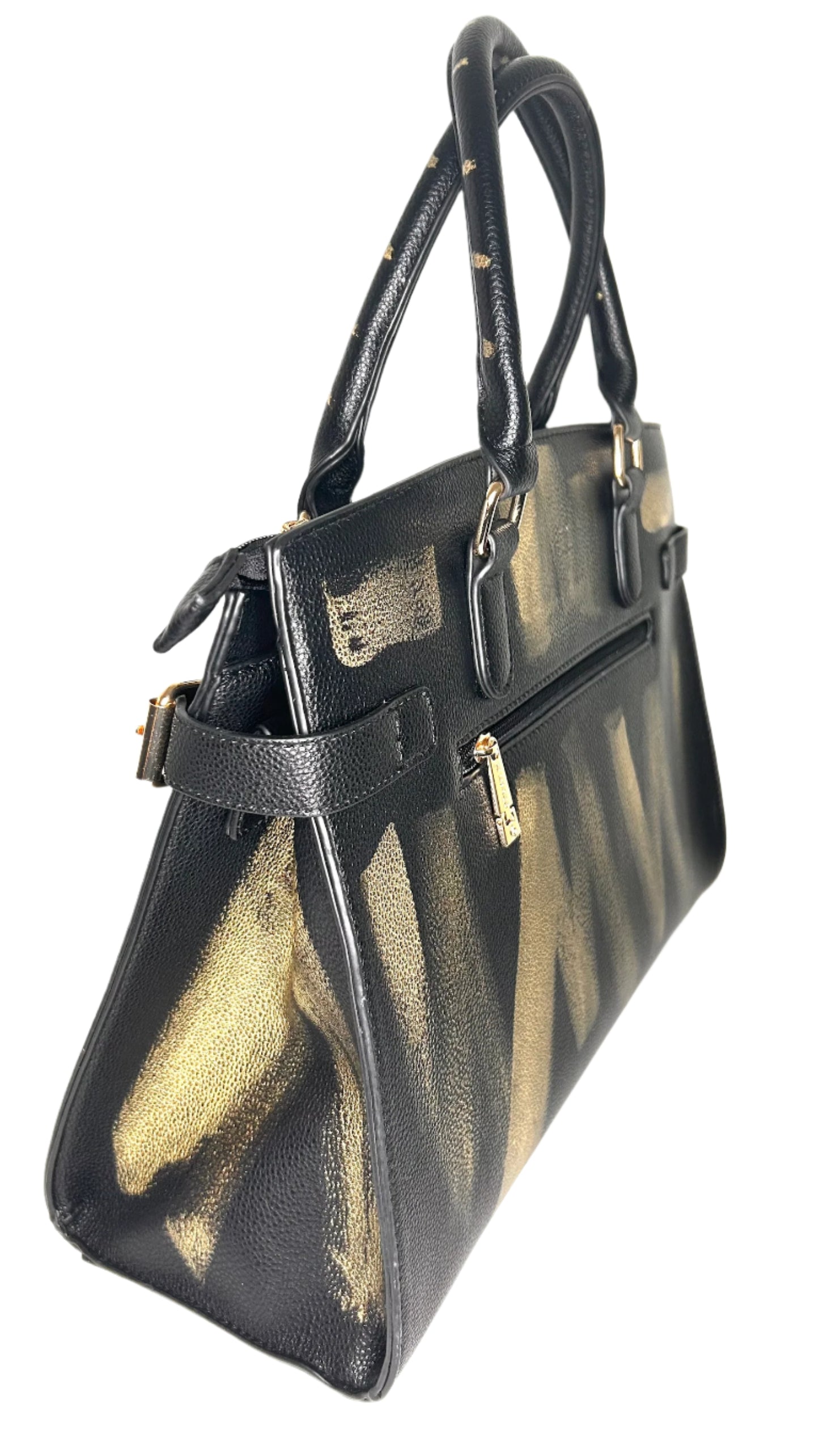 Black handbag with gold accents on a white background