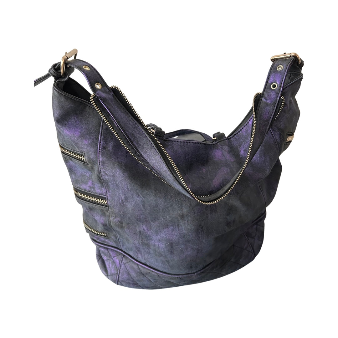 Purple leather handbag with gold zippers on a white background