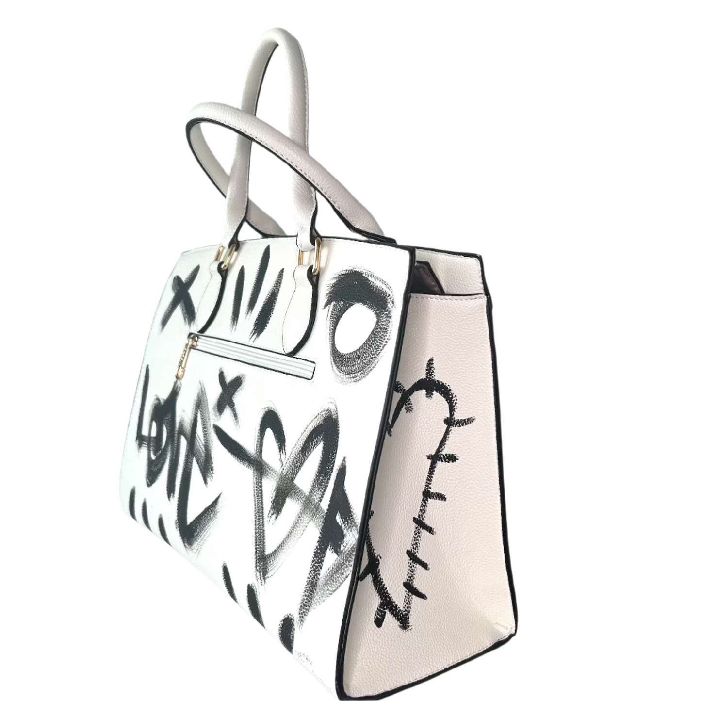 White handbag with black abstract designs on a light gray background