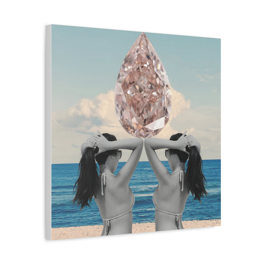 Two people holding a large diamond above their heads on a beach with ocean and sky background