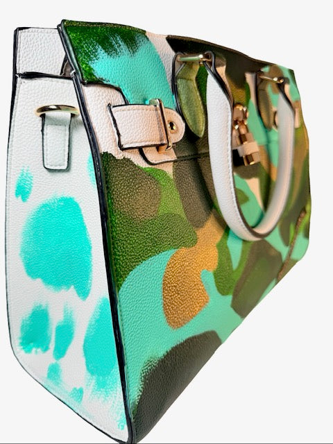 Multicolored handbag with a camouflage pattern on a white background